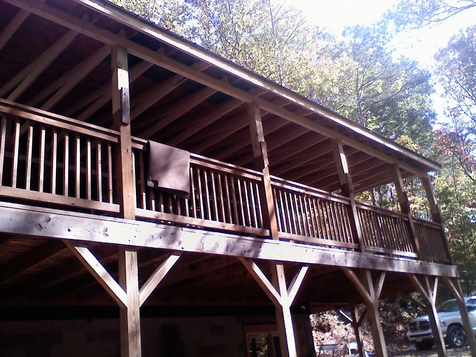 Timber framing under a new elevated porch and deck — Roof Leak Repair in Ravena by Roofing Brothers